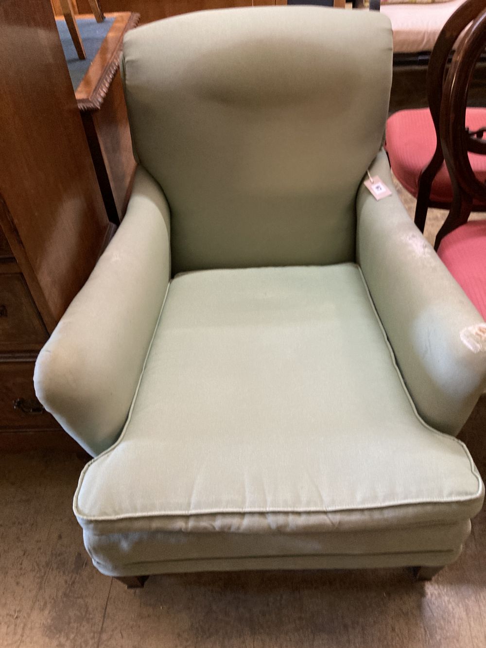 An Edwardian upholstered armchair, width 71cm, height 80cm